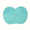 An Apple-Shaped Silicone Makeup Brush Cleaning Mat That Can Deeply Remove Dirt,