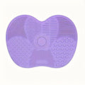 An Apple-Shaped Silicone Makeup Brush Cleaning Mat That Can Deeply Remove Dirt,